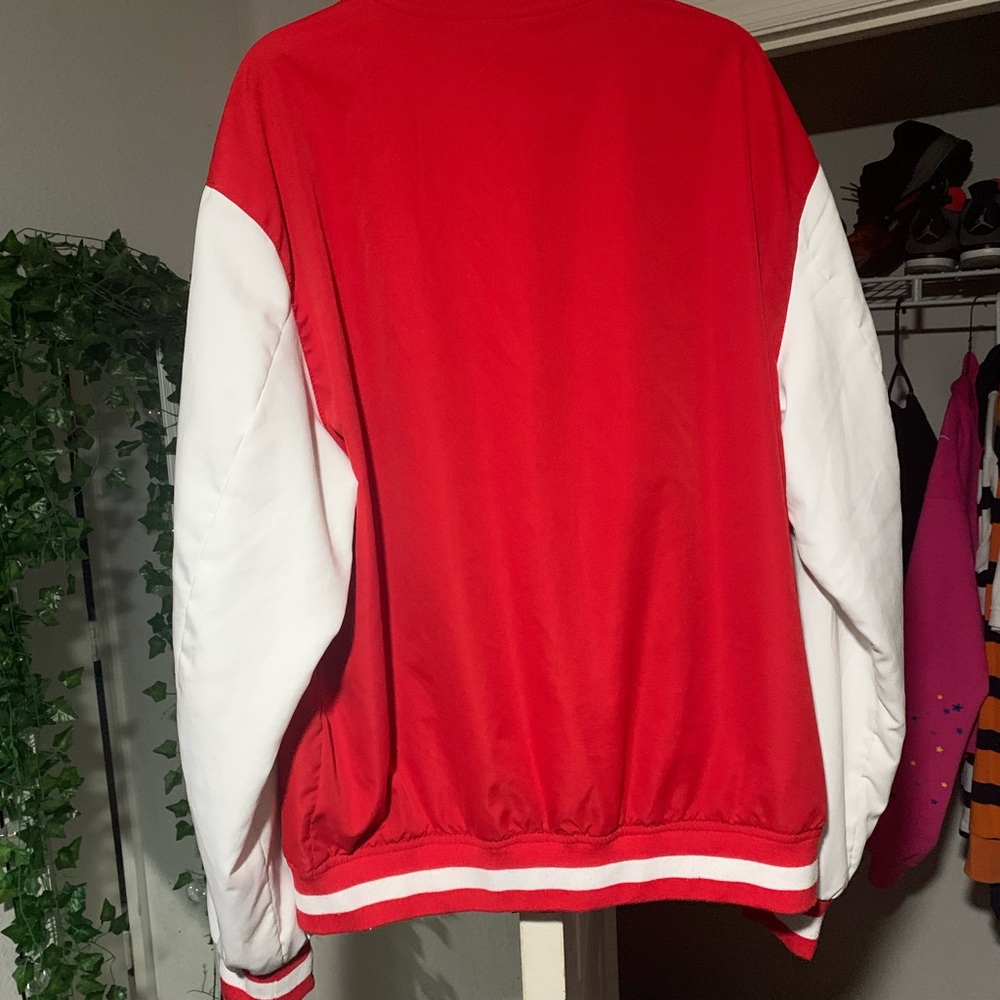 red and white varsity jacket, worn once